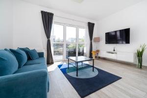 Helińskiego Comfy Apartment by BookingHost