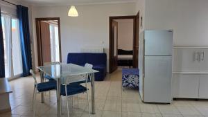 Olive Breeze Apartment 2 by Golden Host