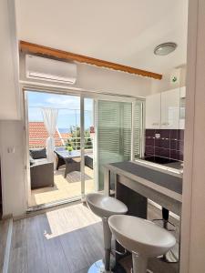 Apartment Ana - Sea View Rooftop, Novalja