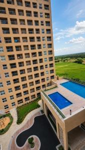 Swalika- Boutique 2 BHK Luxurious Living Pool View GIFT CITY