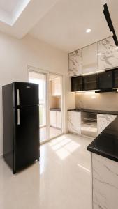 Swalika- Boutique 2 BHK Luxurious Living Pool View GIFT CITY