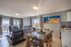 Charming 2-Bedroom Apartment with Ocean and Mountain Views