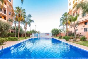 Appartement moderne avec piscine et parking securise