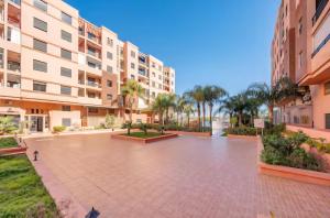 Appartement moderne avec piscine et parking securise