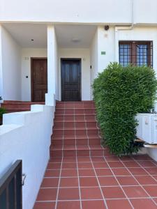 Chalet adosado en urbanización con precioso jardín