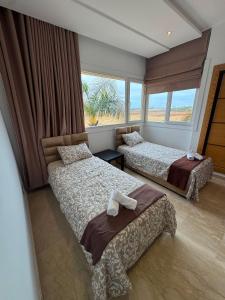 Cozy home with beach view & pool at Evasion Bouznika