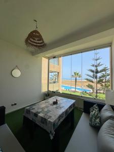 Cozy home with beach view & pool at Evasion Bouznika