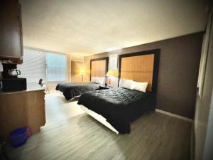 APM Inn & Suites