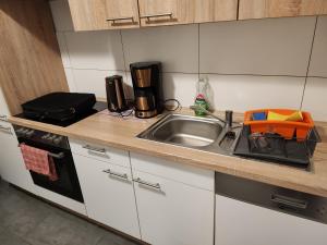 MD- FeWo, City, EG, Top in Preis- Leistung, Lage, Deluxe App mit 2 Schlafzimmer, Merkmale Qeensize Bett, Romantk DZ