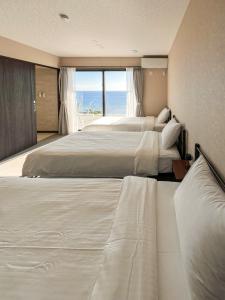 Bella Vista-Oceanview Hilltop Penthouse in Motobu