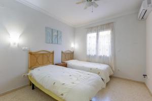 House with garden at Oliva Nova MET & Golf & Padel & Beach resort