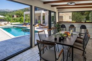 NEW! Stylish 4-Bedroom Villa Agrosa with 30 m2 Private Pool, Hydromassage, Finnish Sauna and Fun zone