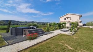 PP11 - Potenza Picena, nuovo trilocale con piscina e aria condizionata