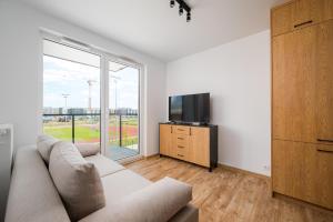 Heweliusza 8 Homely Apartment by BookingHost