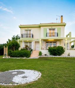 Luxury Beachfront Villa Poseidon Artemisiou Παραθαλάσσια Βίλα στην βόρεια Εύβοια για φιλοξενία 9 ατόμων