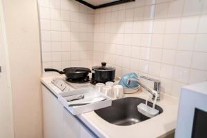 1003Room 5 mins walk from JR Kinshicho North Exit On level 10 with lift access offering a clear view of Tokyo Skytree Easy rail access includes a balcony plus quiet indoor spaces quiet indoor space