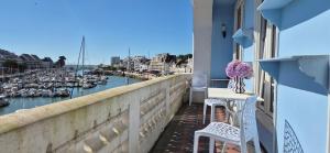 Appt. T3 type Haussmannien vue mer sur port