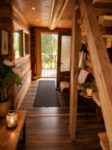 Peaceful Nature Cottage near Talsi with Hot Tub, Sauna & Pond, Camping Ives