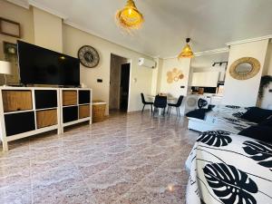 Appartement lumineux à Orihuela Costa avec 3 piscines dont 1 chauffée
