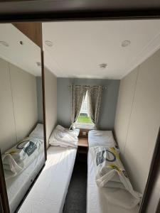 8 Berth Caravan With Front Decking At Haven Orchards In Essex Ref 15011H