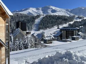 Studio-cabine confortable à Le Lioran, proche pistes et commerces - FR-1-787-92