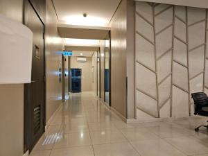 CozyNest in Avida Riala IT Park T2, Pool,Fast WIFI