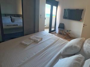 Luxury 2BR Sea View & Garage & Twin Towers Becici