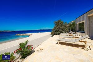 BUQEZ ECO RESORT - Villa 27 - Direkt am Strand