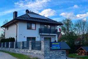 Apartamenty Nad Rzeką z balią
