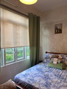 Work Stay Suite with Garden Access near Venice Grand Canal and BGC