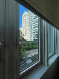 Work Stay Suite with Garden Access near Venice Grand Canal and BGC