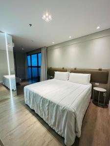 Suíte Vista Lateral · Exclusividade Pé na areia no Blue Sea