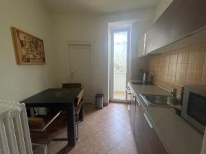 2 BDR Apartment with nice Terrace and Parking