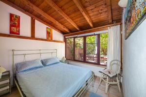 Calaverde - in villaggio con piscina - Villetta con giardino a 200m dal mare
