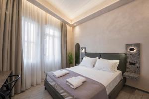 CAVO III Luxury Boutique Rooms