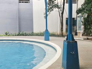 A Million Escape I 55" TV Queen Bed Studio - Sunrise Kasara Pasig