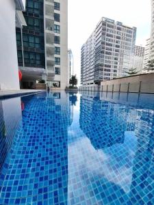 Calming 1-BR Fast WIFI Uptown BGC Stunning Views