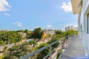 Spacious 2BD with balcony and pool, close to everything