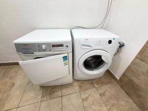 Quiet apartment with kitchen, parking & laundry room