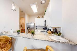 3rd floor condo wsauna pools tennis court near theme parks basketball court
