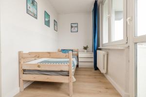 Rooms in a shared apartment Kinowa 25 near Park Skaryszewski and Stadion Narodowy