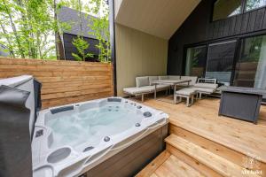 Entracte Spa prive Vue sur le boise Chalet premium pour 10 personnes