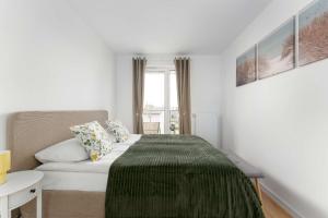 Bright Apartment in Kołobrzeg with Balcony and Parking by Noclegi Renters