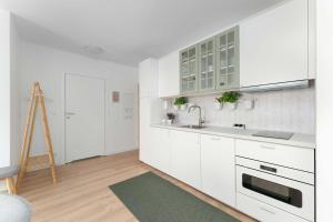 Bright Apartment in Kołobrzeg with Balcony and Parking by Noclegi Renters