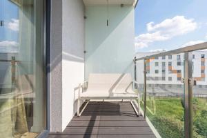 Bright Apartment in Kołobrzeg with Balcony and Parking by Noclegi Renters
