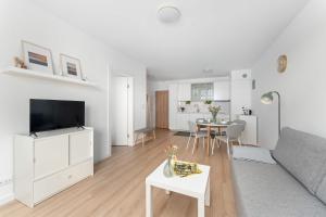 Bright Apartment in Kołobrzeg with Balcony and Parking by Noclegi Renters