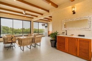 ELIVAAS Signature Villa Riviere 9-BHK Private Riverfront Estate with 2 Infinity Pools, Lift, Lounge Area & Kids Room