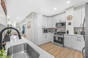 Trendy East End Escape with Spa Bath and Game Loft with Foosball and Poker