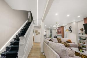 Trendy East End Escape with Spa Bath and Game Loft with Foosball and Poker