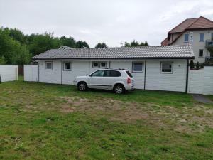 Radosna Zatoka - DOMKI Z OGRODZENIEM